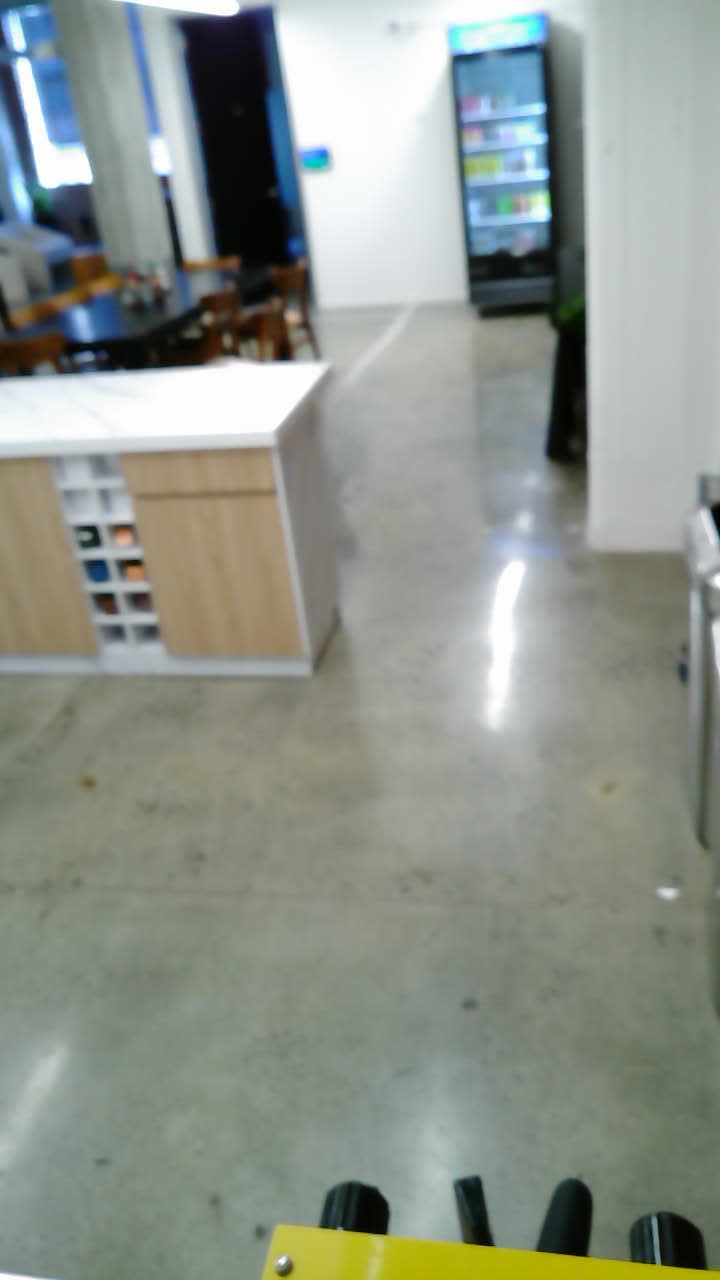 vertical camera view looking down at the espresso machine area