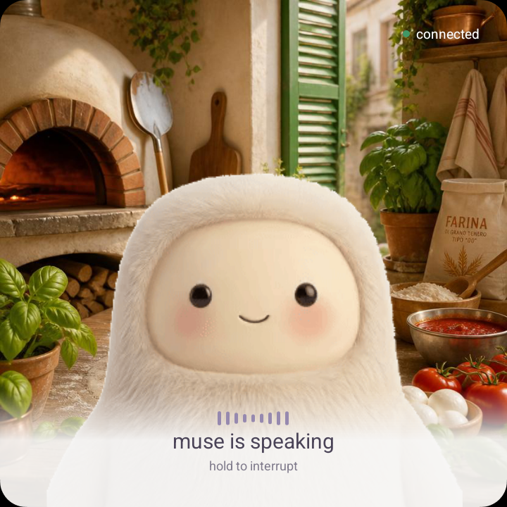 Muse speaking in front of a kitchen with a pizza oven