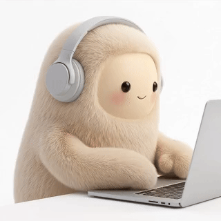 The soft white Muse character working at a laptop